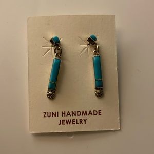 Real sterling silver, authentic Native American earrings.